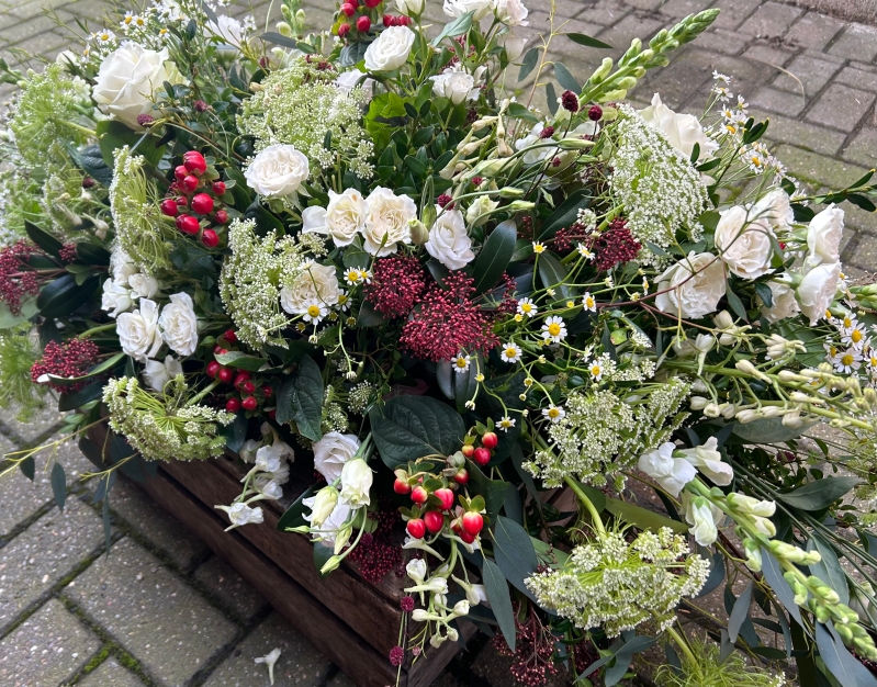 Meadow Casket Spray in Whites with warm tones