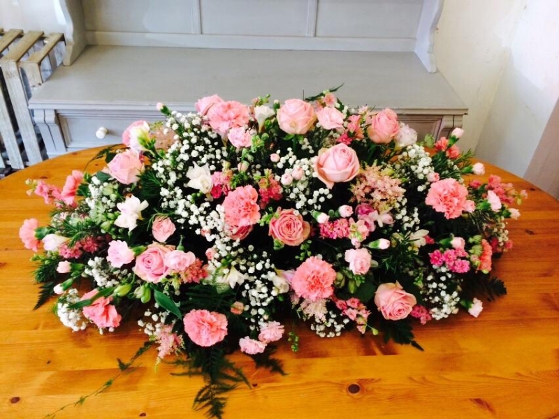 Rose and carnation casket spray