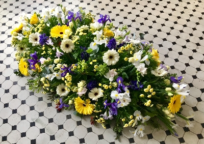 Gerbera and seasonal selection casket spray