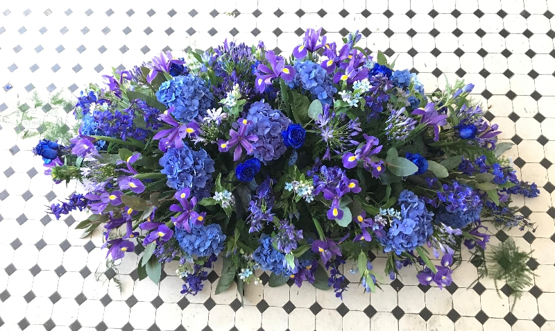 Luxury Casket Spray in Blue and Purple