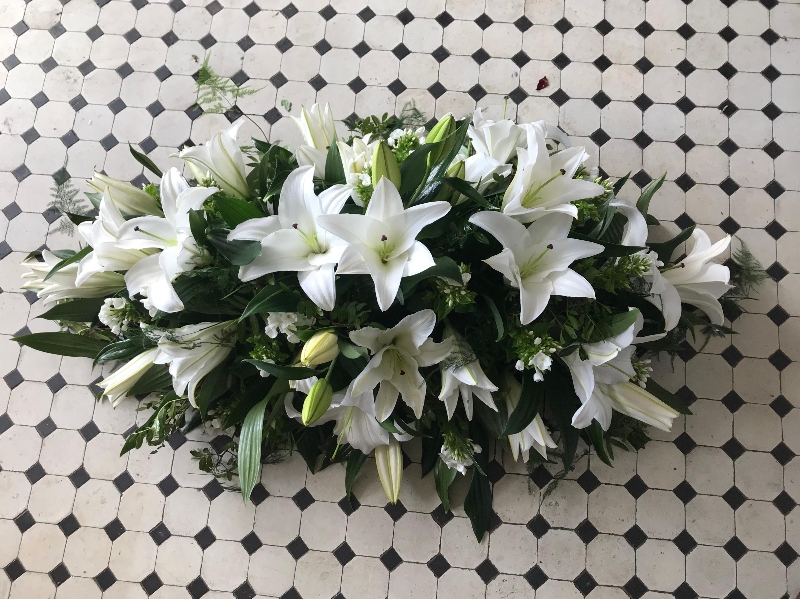 White lily casket spray