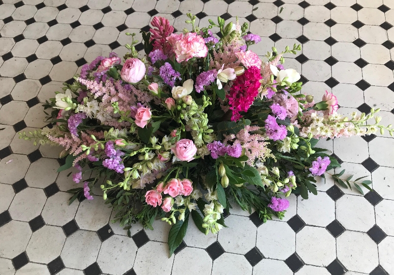 Meadow Casket Spray in Pinks