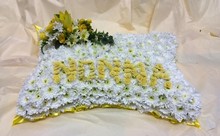 Based pillow with floral message