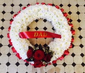 Classic wreath based in whites with red trim