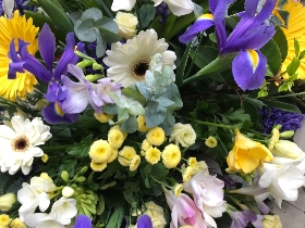 Gerbera and seasonal selection casket spray