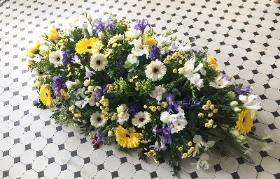 Luxury Casket Spray in Yellow Purple and Whte