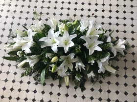 White lily casket spray