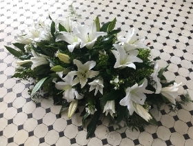 White lily casket spray